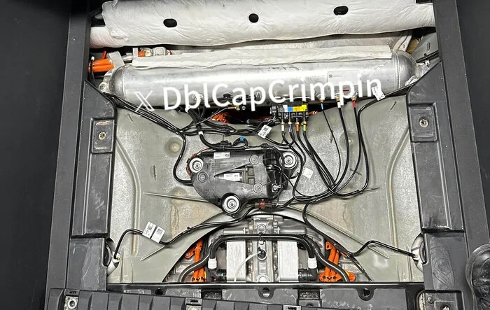 Photo: Why no spare tire in Cybertruck -- what's under bed floor