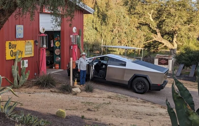 Photos - Cybertruck goes home to a farm ranch and shares garage with classic cars