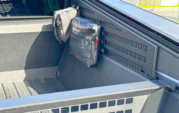 MOLLE storage bags installed on MOLLE panels