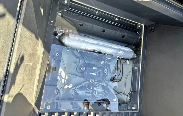 Air Suspension Pump / Reservoir Tank location below the Cybertruck bed floor (photos)