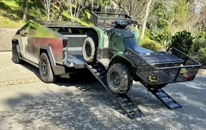 Cybertruck Tailgate Ramp used for loading ATV onto bed