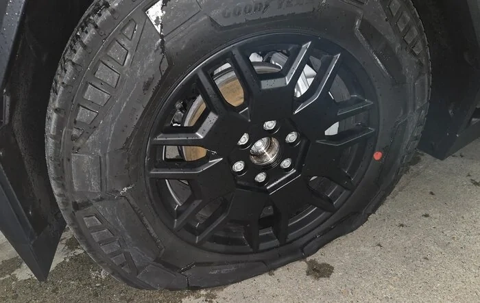 Quick Quack car wash track popped my tire!