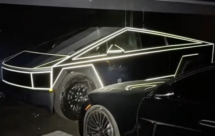 Tron style glow in the dark reflective pinstripe / outline wrap Cybertruck (updated with in-motion video)