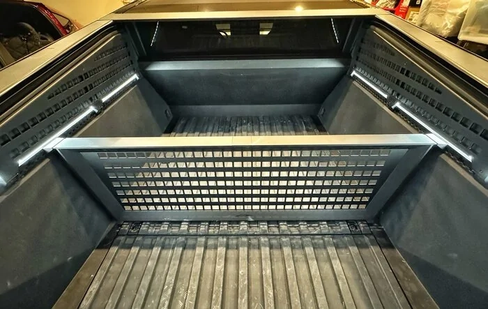 Fixed Vault Cargo Divider replacements being sent by Tesla