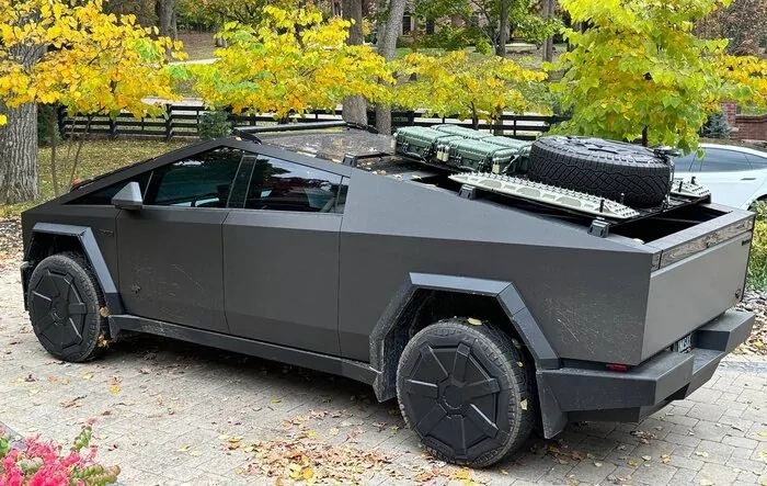 Customized roof rack installed with unique spare tire placement