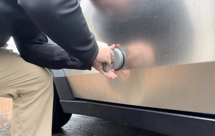 $3,000 door dent estimate repaired with $25 suction cup dent puller