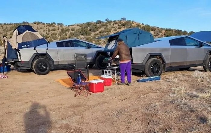 Equinox camping w/ double Cybertrucks