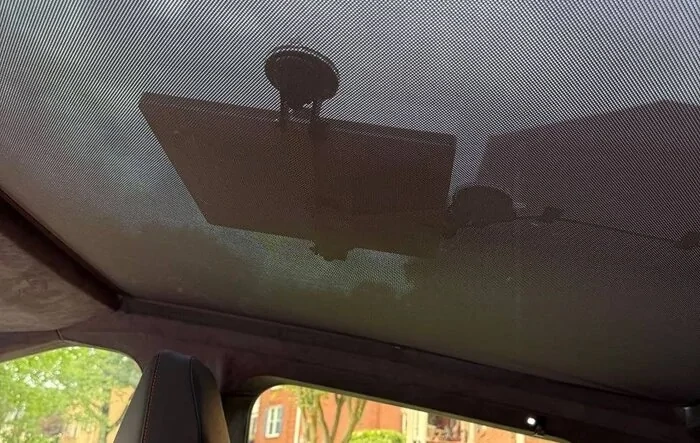 Installed Starlink Mini under roof glass