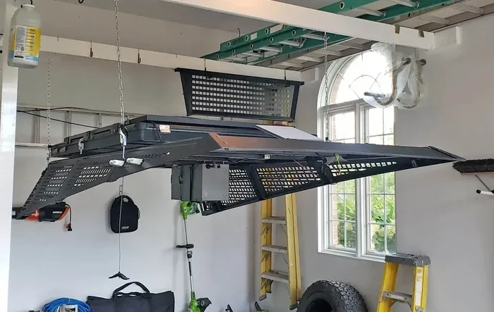 Removing my Urander bedrack using custom overhead frame in garage ceiling