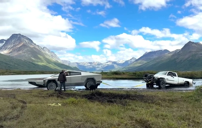 Cybertruck pulls Ram 2500 out of the river
