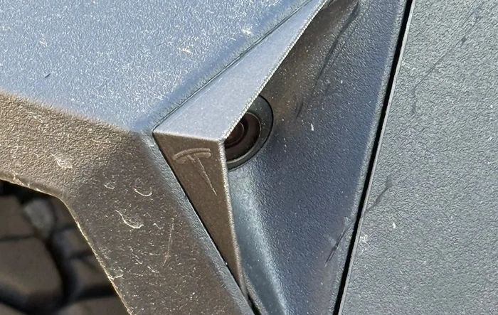Side camera cover installed on fender (to protect against elements / snow / ice)