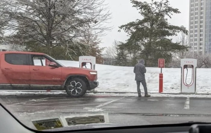 First Supercharger with Magic Dock CCS Adapter charges up a Rivian