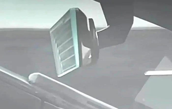 Rear view mirror display screen confirmed in closeup photo?