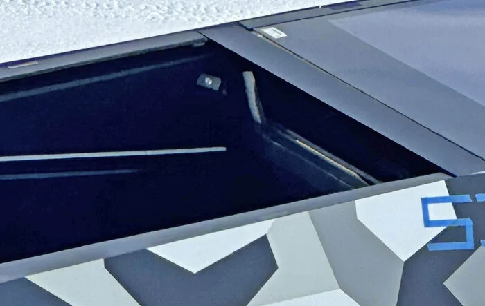Cybertruck rear window down?! (photos from winter testing)