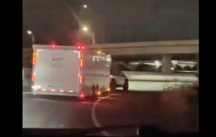 Tesla CyberTruck pulling trailer smokes Prius getting on freeway 🤣