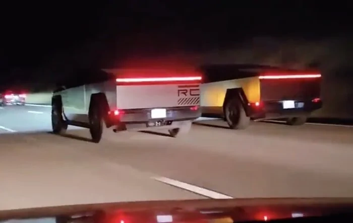Two RC Wrapped Cybertrucks driving in formation at night 🤩