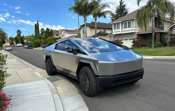 Cybertruck parked on street in residential neighborhood [9/9 pics]