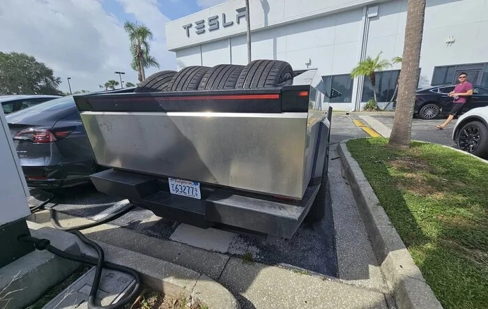 Cybertruck spotted carrying 8 tires in bed! @ Tesla Store in Merritt Island, FL