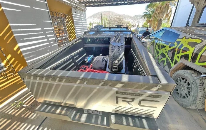 Mexico Pics: Cybertrucks w/ roof rack accessories (Starlink & recovery boards) and bed vault haul (spare, air tank, recovery rope)