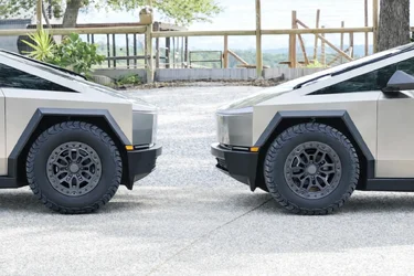 Tesla Cybertrucks face off in nature.webp